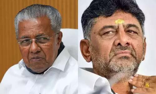 பெங்களூர் பிரச்சினை: கேரள முதல்வர் டி.கே.சிவகுமார் இடையே வார்த்தை போர்